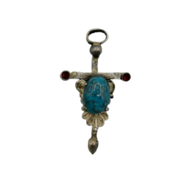 Croix noyau turquoise